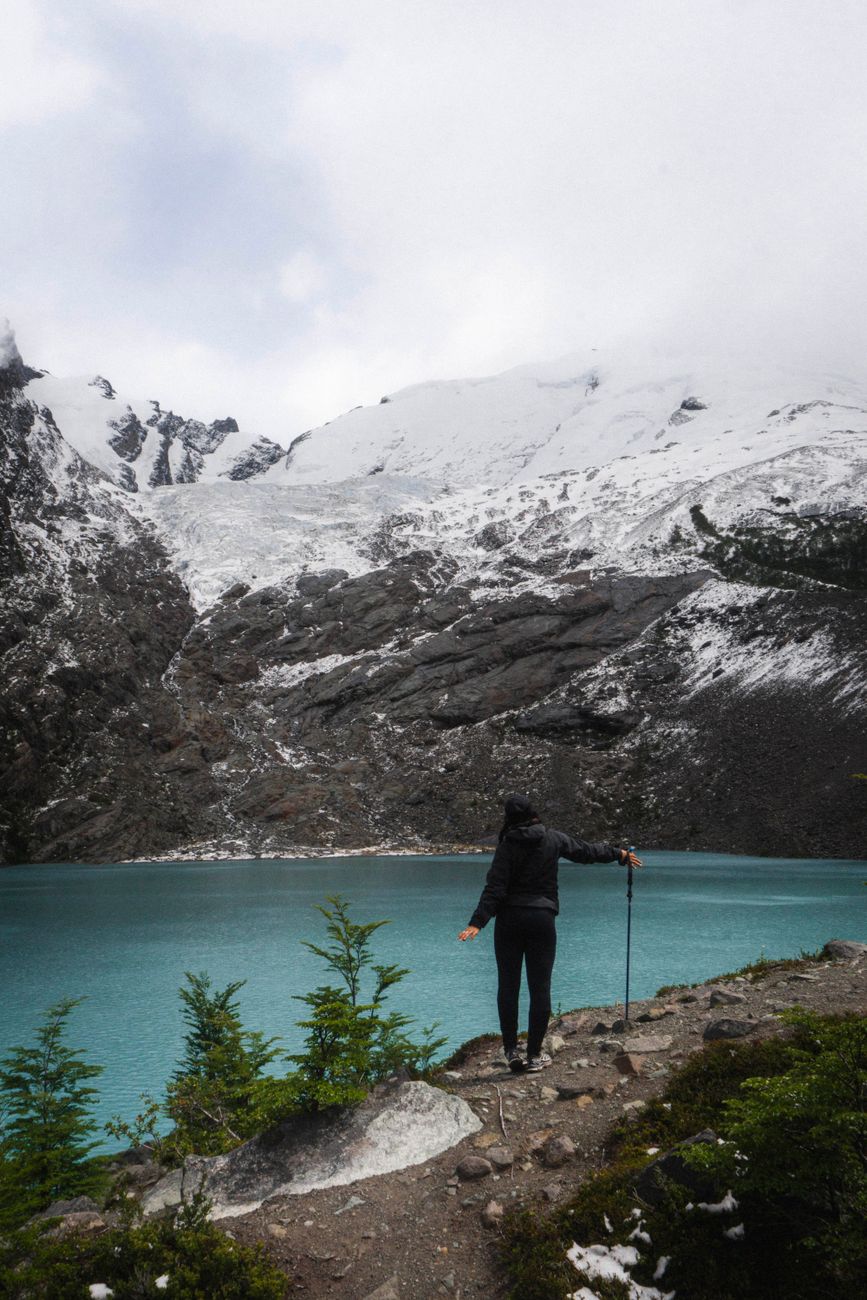 Granite peaks of Torres del Paine reflecting in calm turquoise glacial lake